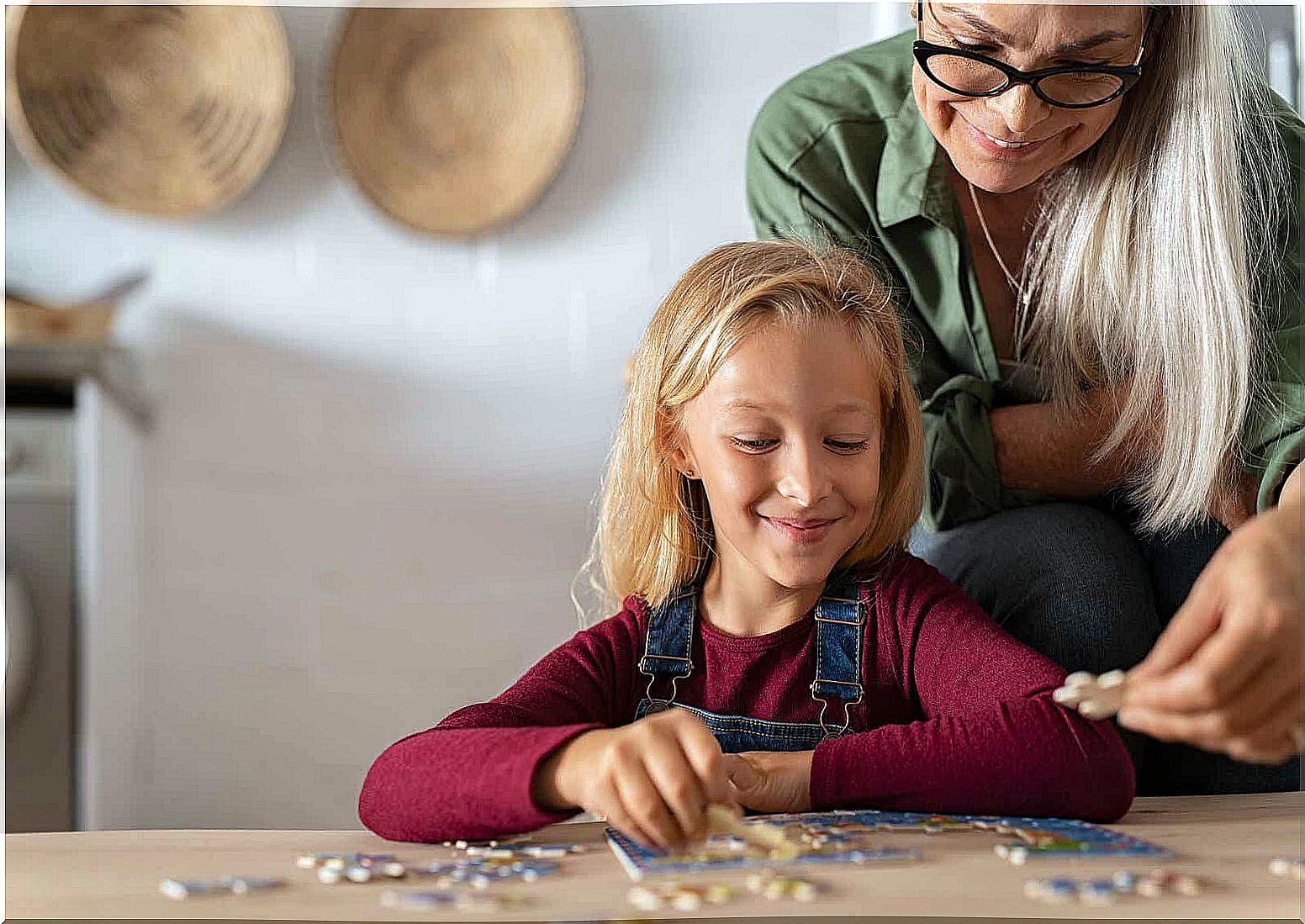 A child is making a puzzle