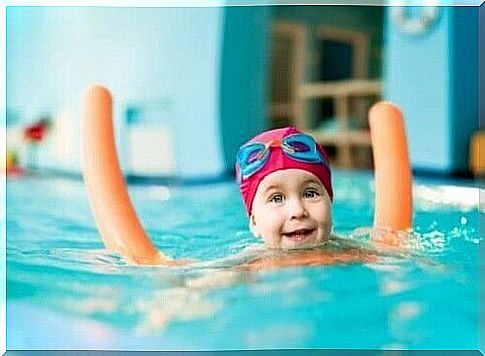 a happy baby in the pool