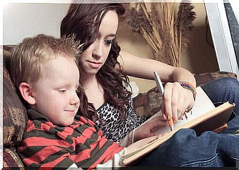 nanny helping boy write