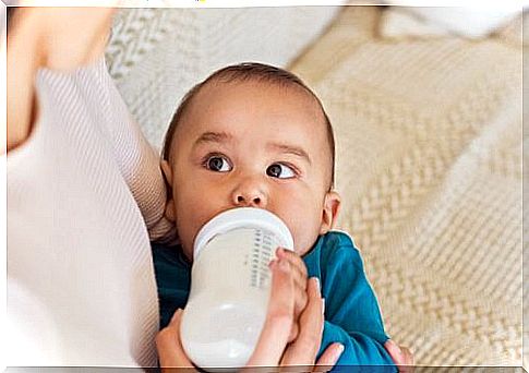 Baby with bottle