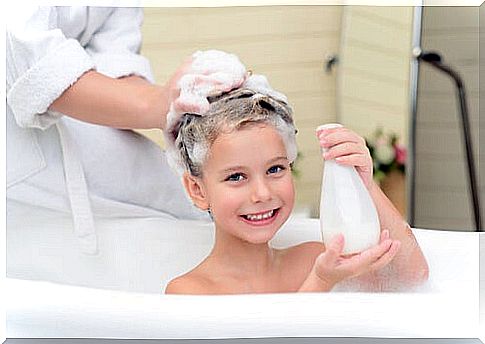 girl getting her hair washed