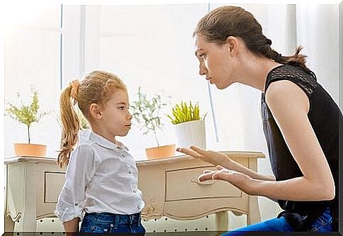 mother teaches her daughter discipline