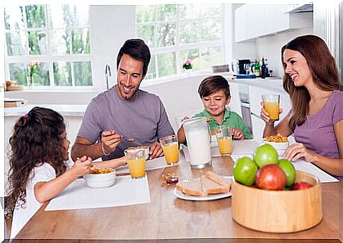 family eating breakfast together