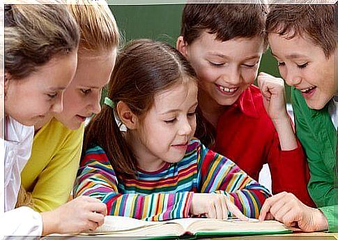 children reading a book