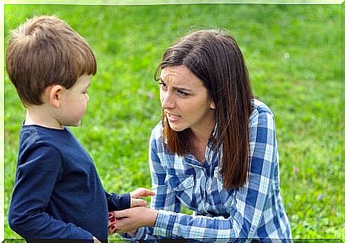 mother talking to her child in a park