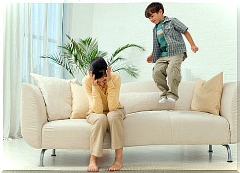 Mother becomes stressed while the child behaves naughtily