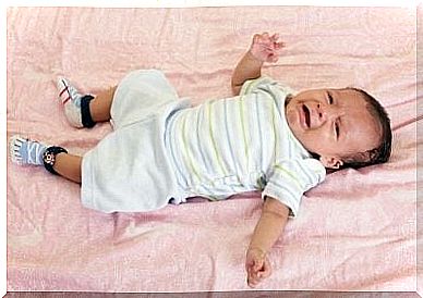 baby with colic crying