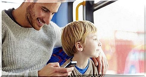 father spends time on his mobile instead of on his son