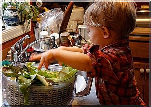 boy helps with the cooking