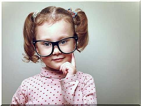 little girl with glasses