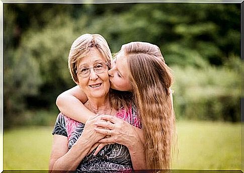 girl kisses grandma