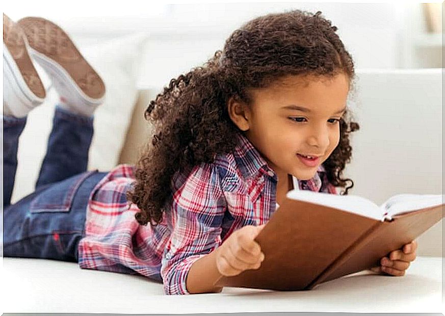 girl reading in book