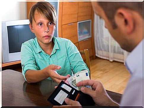 boy asking his father for money