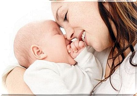 mother and baby having forehead to forehead