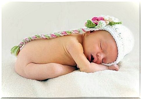 Babies need sleep - baby sleeps with hat