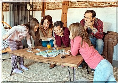 family playing board games