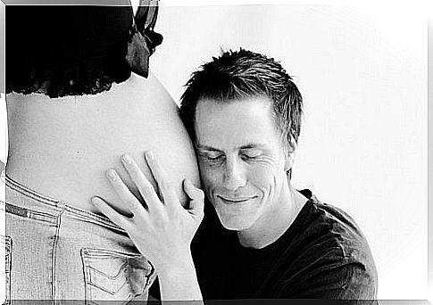 When you become a father - you hug a pregnant belly