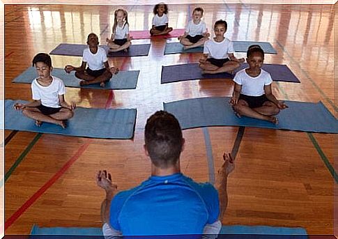 children practicing yoga